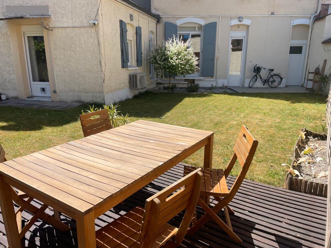 Appartement avec jardin clos privatif - Photo 1 - Reims